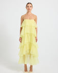 Woman wearing a yellow tiered Maxi Dress