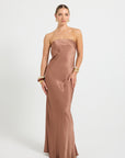 Woman wearing a strapless chocolate brown satin evening gown