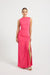 Woman wearing a hot pink evening gown with a slit