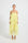 Woman wearing a yellow tiered Maxi Dress 