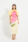 Woman wearing a yellow midi dress with puff sleeves with pink floral design. 